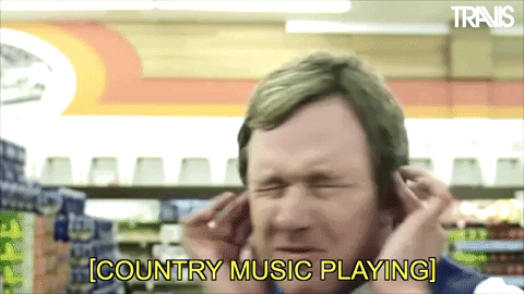 Man Ear Plugs To Avoid Hearing Country Music GIF