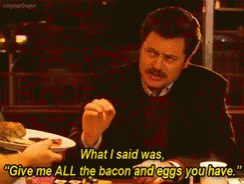 Man Eating Bacon And Eggs Says Give Me All The Bacon And Eggs You Have GIF