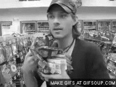 Man Eating Chips in Store