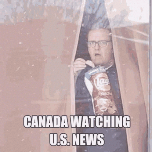 Man Eating Chips Watching Canada