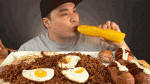 Man Eating Large Breakfast GIF