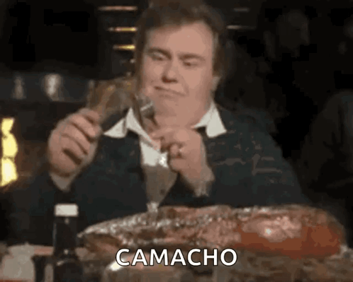 Man Eating Large Meat Piece