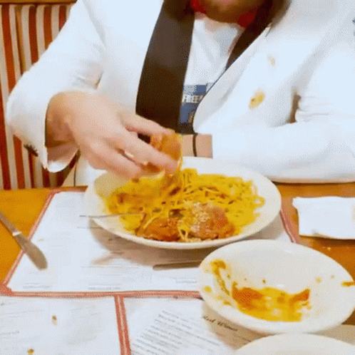 Man Eating Meatball With Bare Hand GIF
