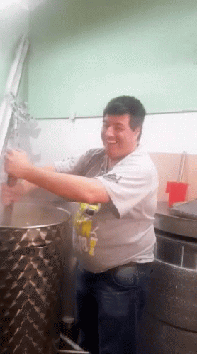 Man Enjoys Cooking Stir The Hot Pot GIF