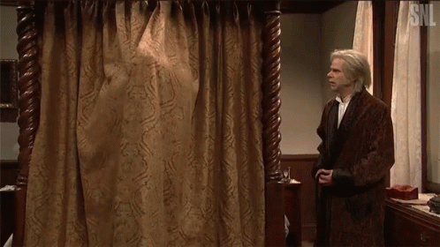Man Entering And Opening Curtain GIF