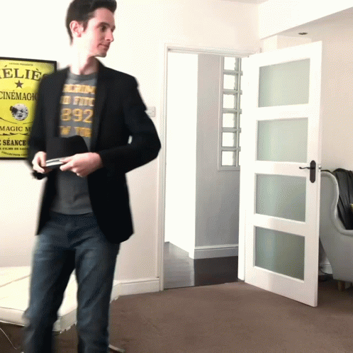 Man Entering The Door Perfect Loop GIF