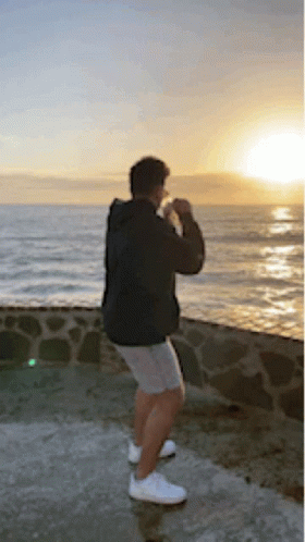 Man Executing Thug Shaker By The Sea GIF