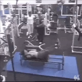 Man Exercising on Bench as Another Watches