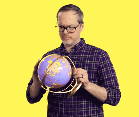 Man Exploring Globe GIF