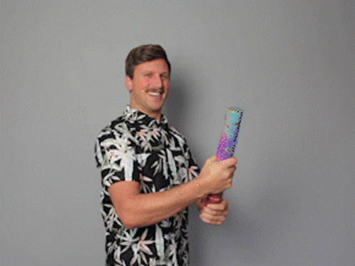 Man Falling Confetti Poppers GIF