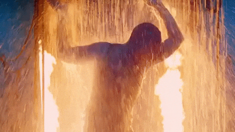 Man Flame On With Water Sprinkler GIF