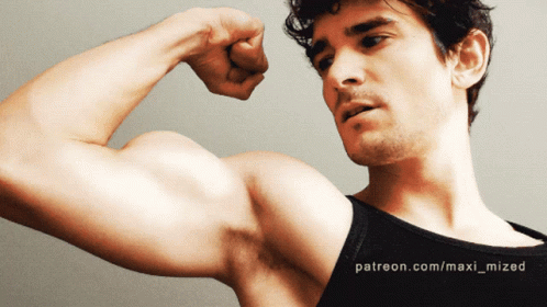 Man Flexing Biceps Muscle Growth GIF
