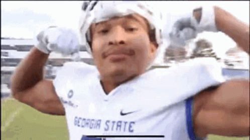 Man Flexing in Georgia State Football Jersey