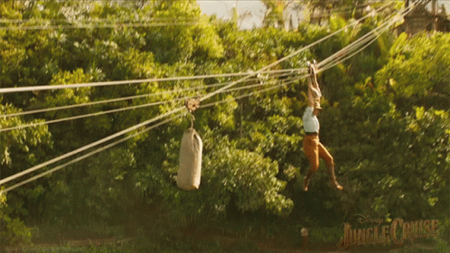 Man Flying on Jungle Cruise Ropes Course
