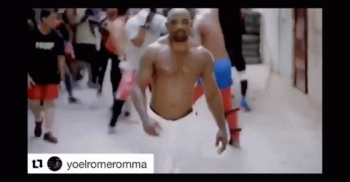 Man Flying Shirtless In Front Of Crowd GIF