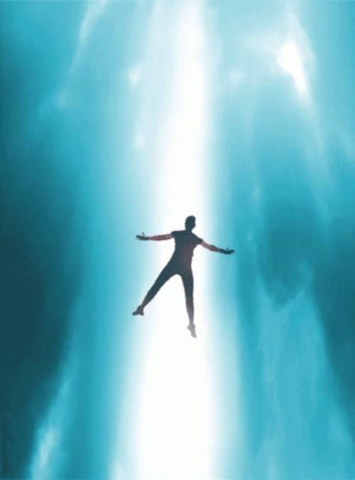 Man Flying Up To Heaven Light Beams GIF