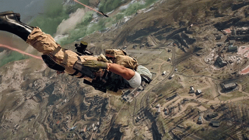 Man Flying With Parachute