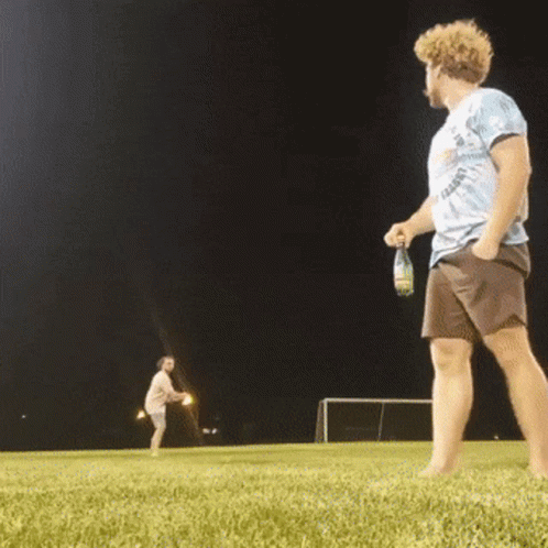 Man Frisbee Catching Trick GIF