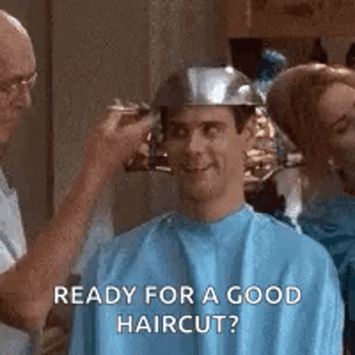 Man Getting Haircut By Barber In Blue Cape GIF