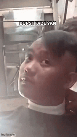 Man Getting Haircut in Barbershop