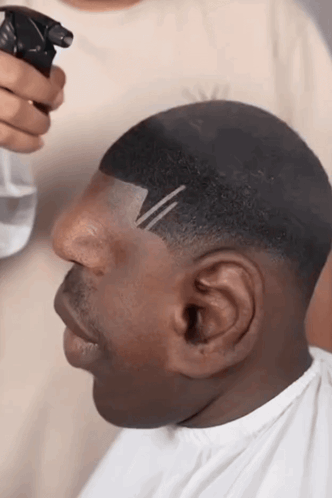 Man Getting Haircut Spray Bottle