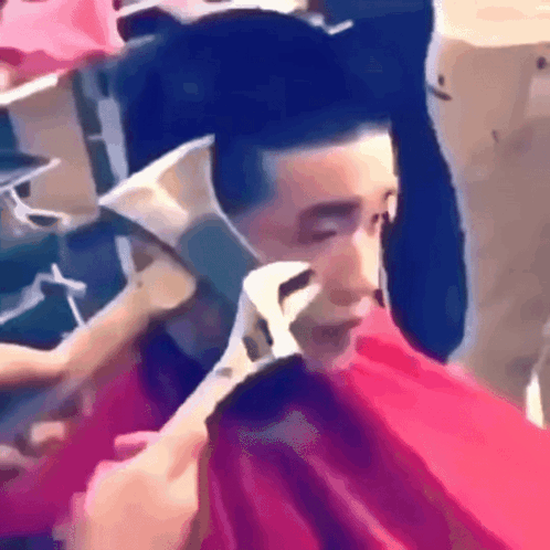 Man Getting Haircut While Wearing Mask GIF