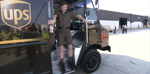 Man Getting Out of UPS Truck