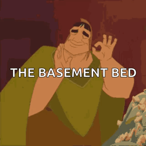 Man Giving OK Sign with Basement Bed