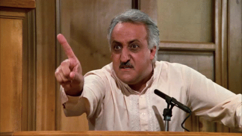 Man Giving Speech and Pointing