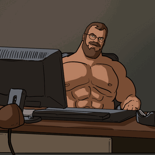 Man Giving Thumbs Up in Front of Computer