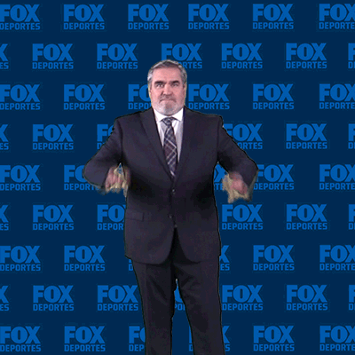 Man Giving Thumbs Up in Front of Fox Deportes