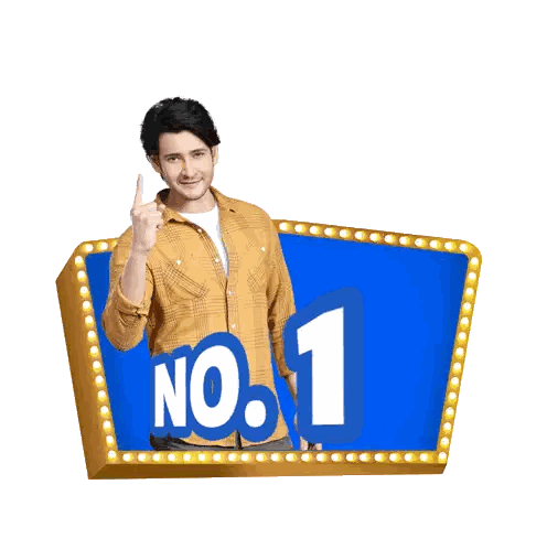 Man Giving Thumbs Up In Front Of No.1 Sign