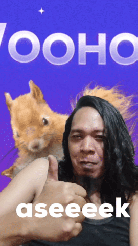 Man Giving Thumbs Up Next To Squirrel GIF