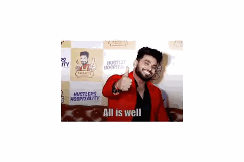 Man Giving Thumbs Up Red Jacket