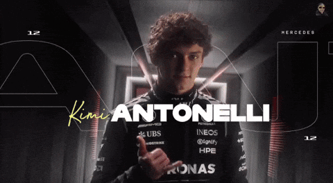 Man Giving Thumbs Up with Antonelli Behind