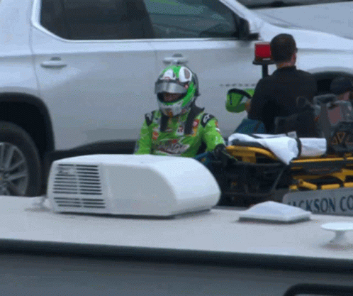 Man Green Helmet on Stretcher Jackson Co Truck