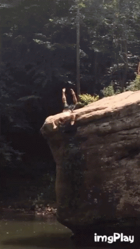 Man Handstanding in Water With Imgplay