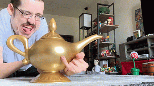 Man Happy For Having Genie Lamp GIF