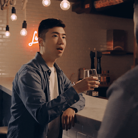 Man Having Conversation And Sipping Wine Stank Face GIF