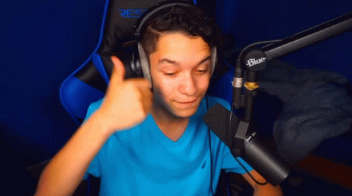 Man Headphones Blue Shirt Thumbs Up