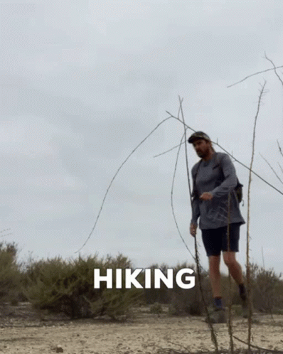 Man Hiking In Desert With Hiking Text GIF