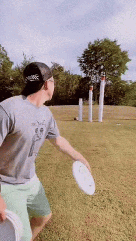 Man Hits Frisbee Target GIF