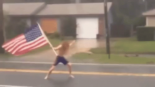 Man Holding American Flag