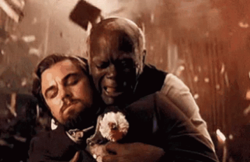Man Holding Another Man's Head With Flying Hammer
