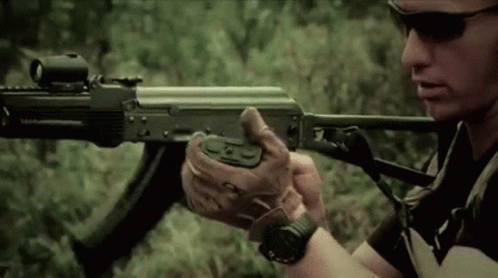 Man Holding Assault Rifle GIF