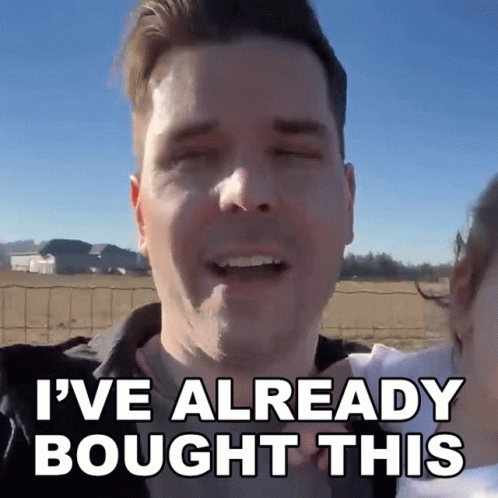 Man Holding Baby Saying Already Bought