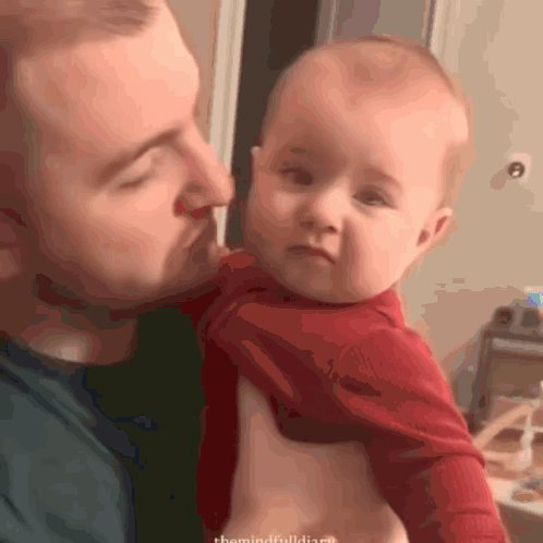 Man Holding Baby The Mindful Diary GIF