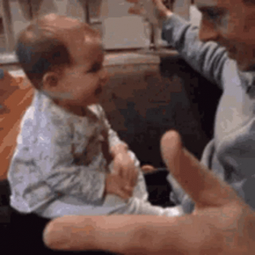 Man Holding Baby