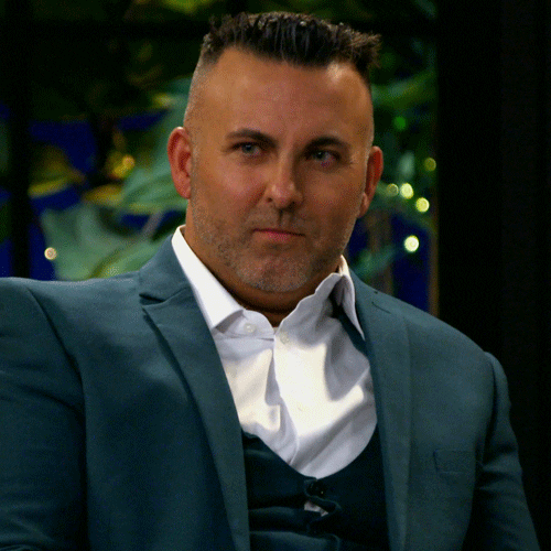 Man Holding Back His Self To React GIF