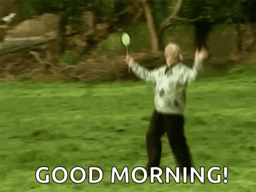 Man Holding Badminton Racket Saying Good Morning GIF